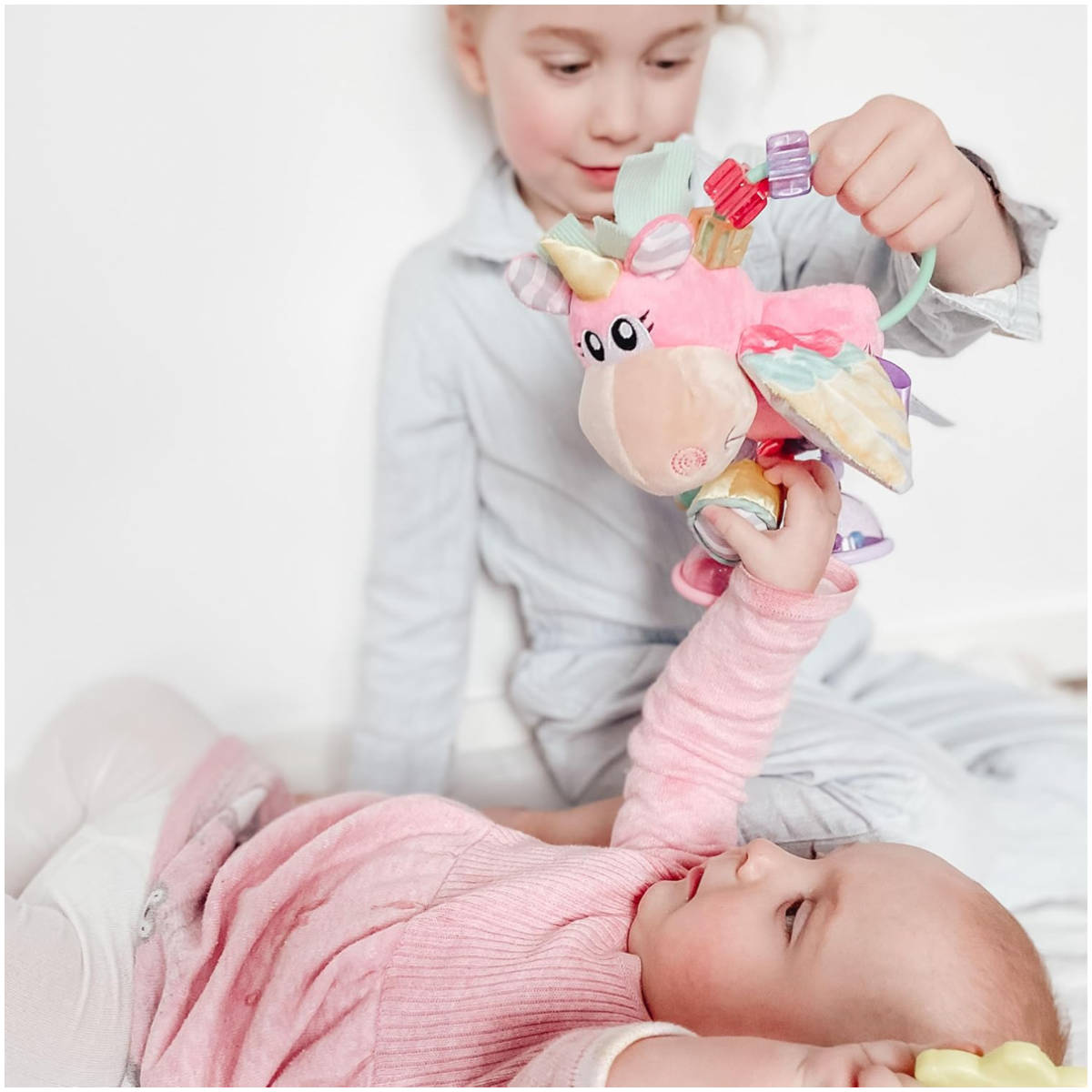 Sonajero Unicornio con Actividades PLAYGRO Clip Clop Rosado
