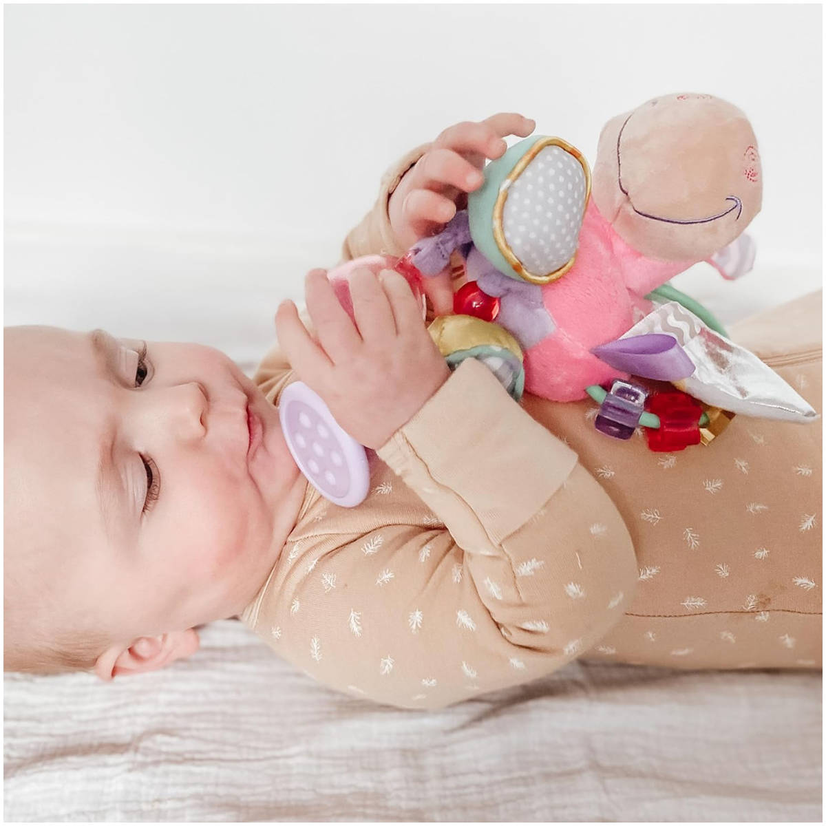 Sonajero Unicornio con Actividades PLAYGRO Clip Clop Rosado