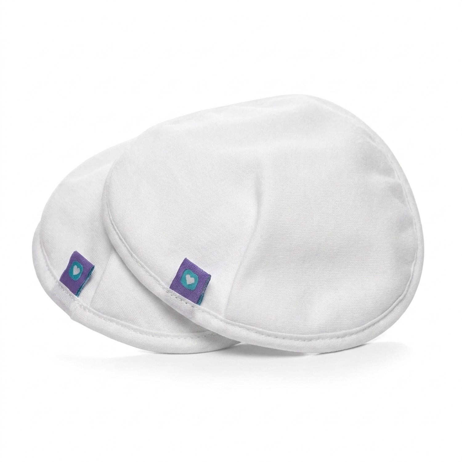 Absorbentes de leche lavables Lansinoh, pack de 4, sobre fondo blanco